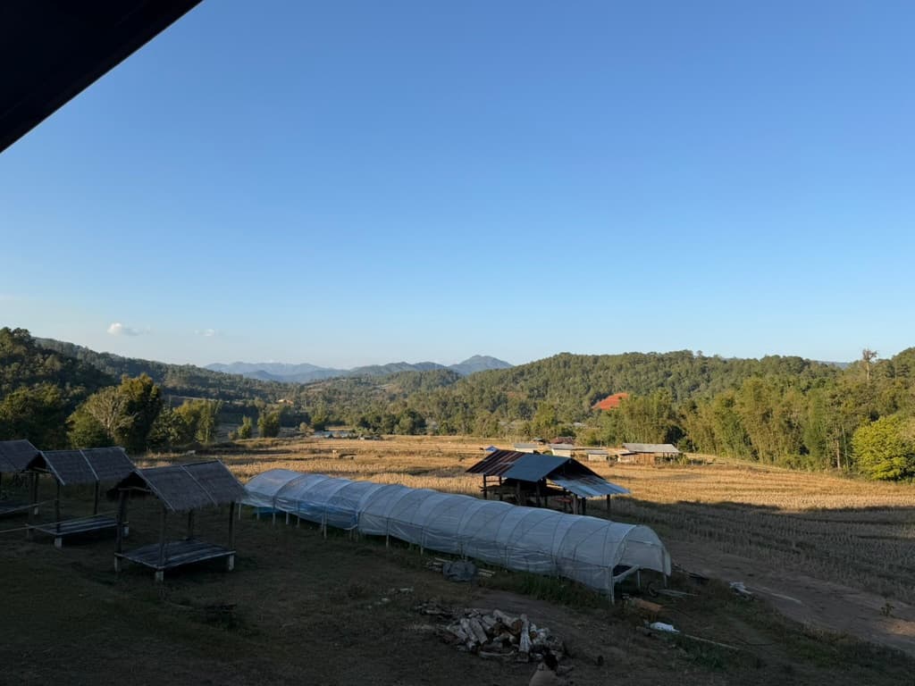The pilot greenhouse overlooking the Mae Win valley